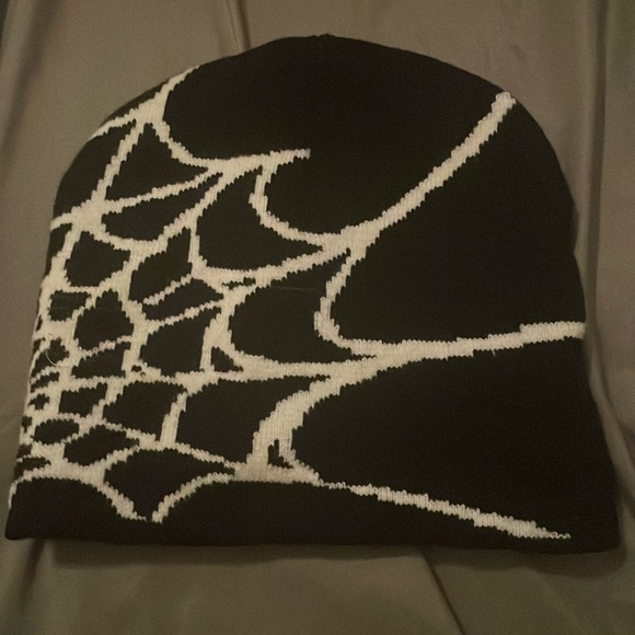This is a black and white beanie spiderwebs this is comfortable and warm - Picture 1 of 4